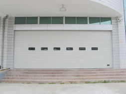 定做安裝沈陽電動卷簾門 保溫車庫門 白鋼卷簾門 電機維修廠家